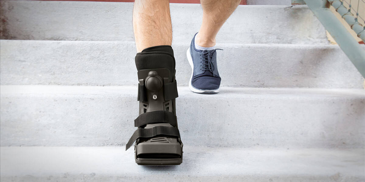 walking down the stairs with ankle brace
