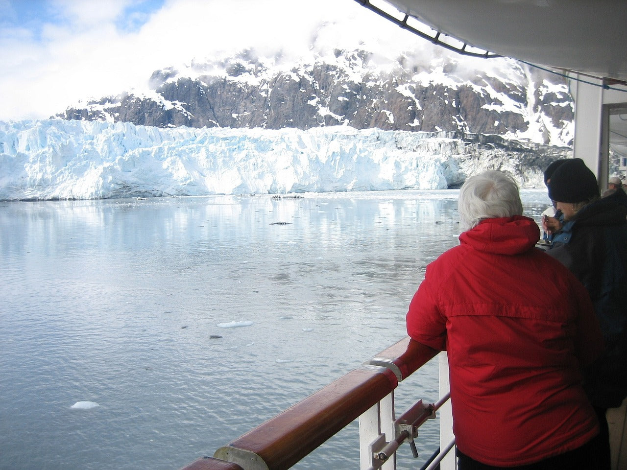 Woman wearing waterproof jacket on Alaska cruise