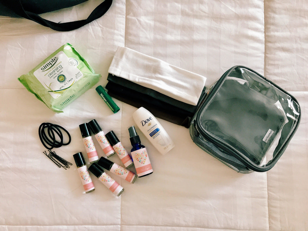 Cleansing wipes, travel bottles, hair ties, and other travel essentials