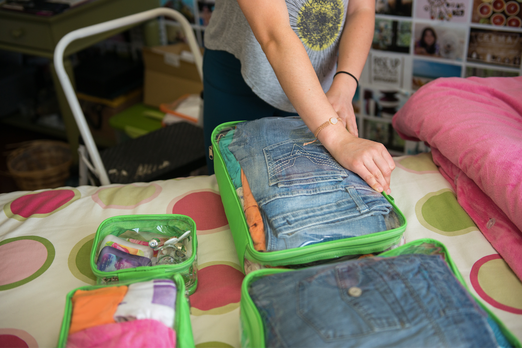 Jeans packed in green medium cube