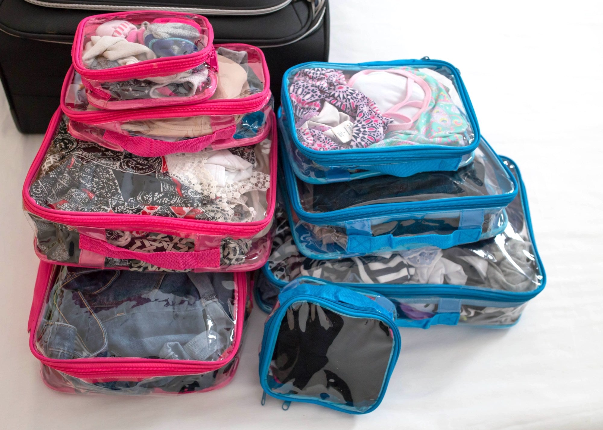 Pink and blue clear packing cubes