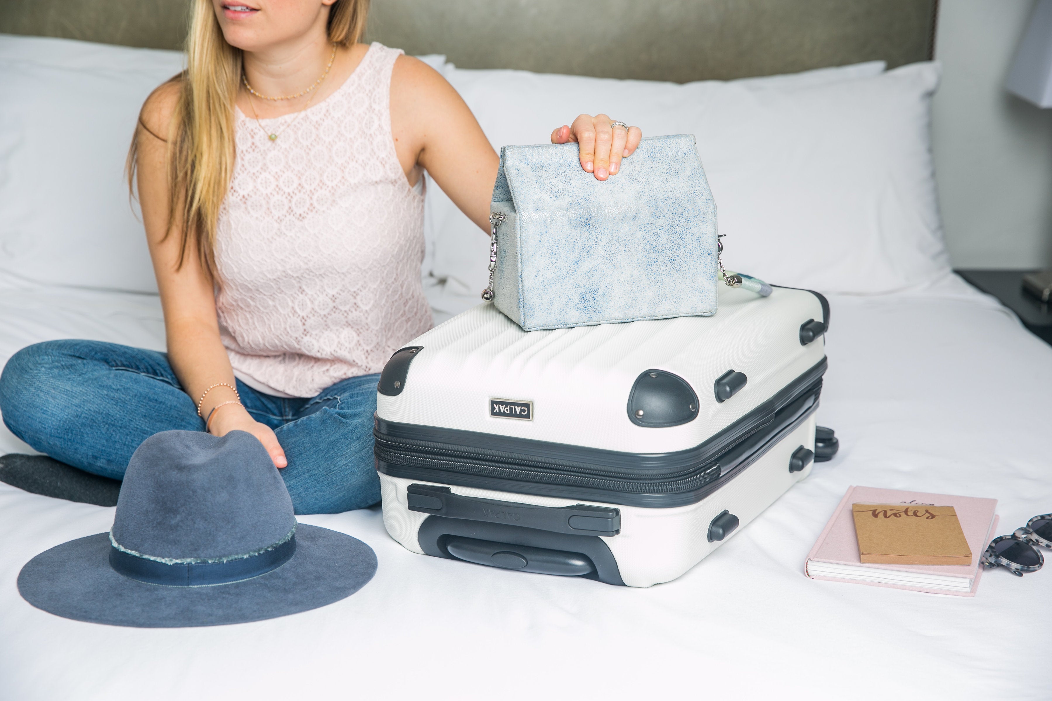 Woman with personal item for flight