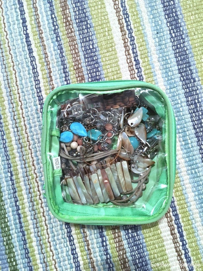accessories inside a green extra small cube