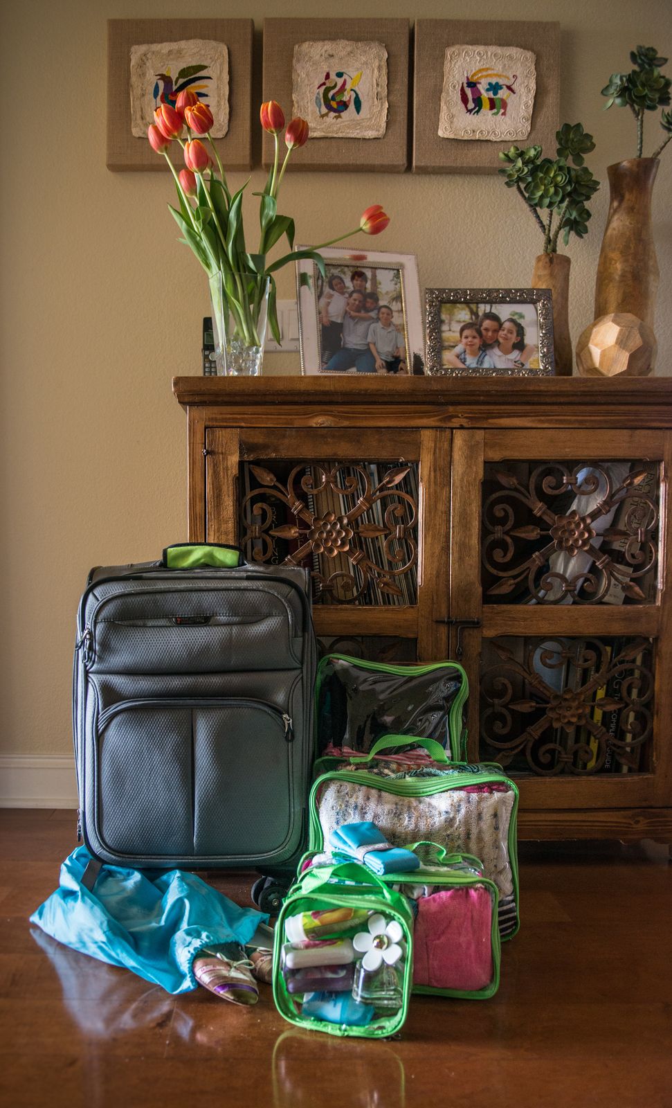 packing cubes beside a carryon suitcase