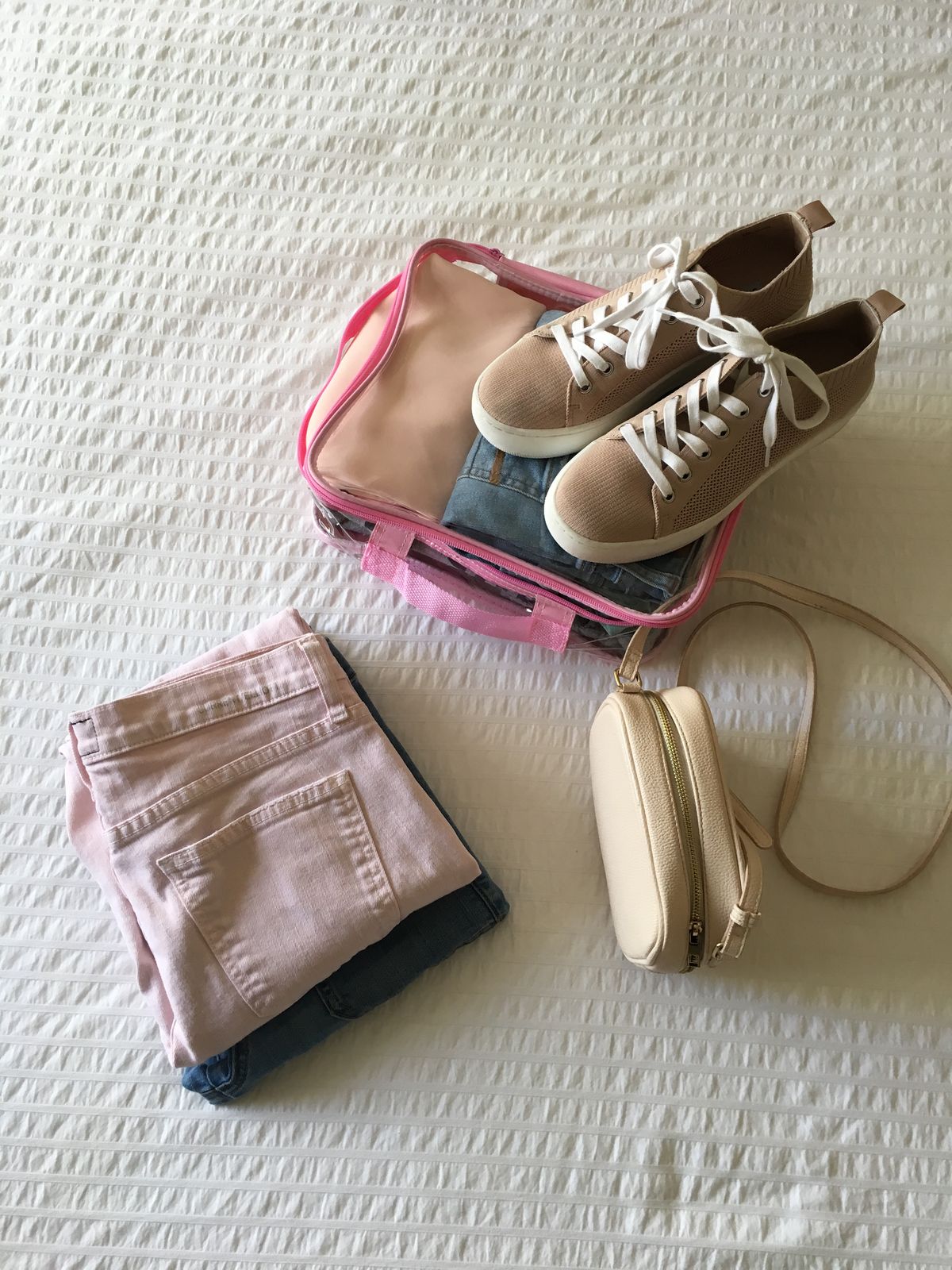Shoes on a pink medium cube