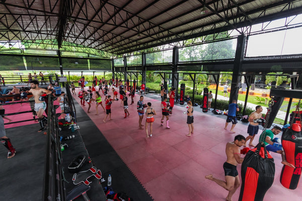 AKA Thailand Facility full of fighters surrounded by jungle and mountain views. 
