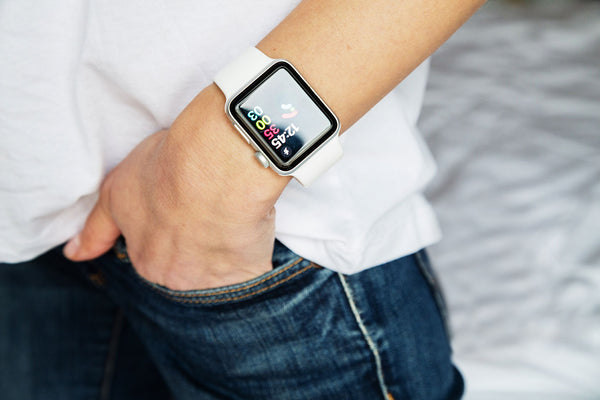 Female hand with modern smart Apple Watch