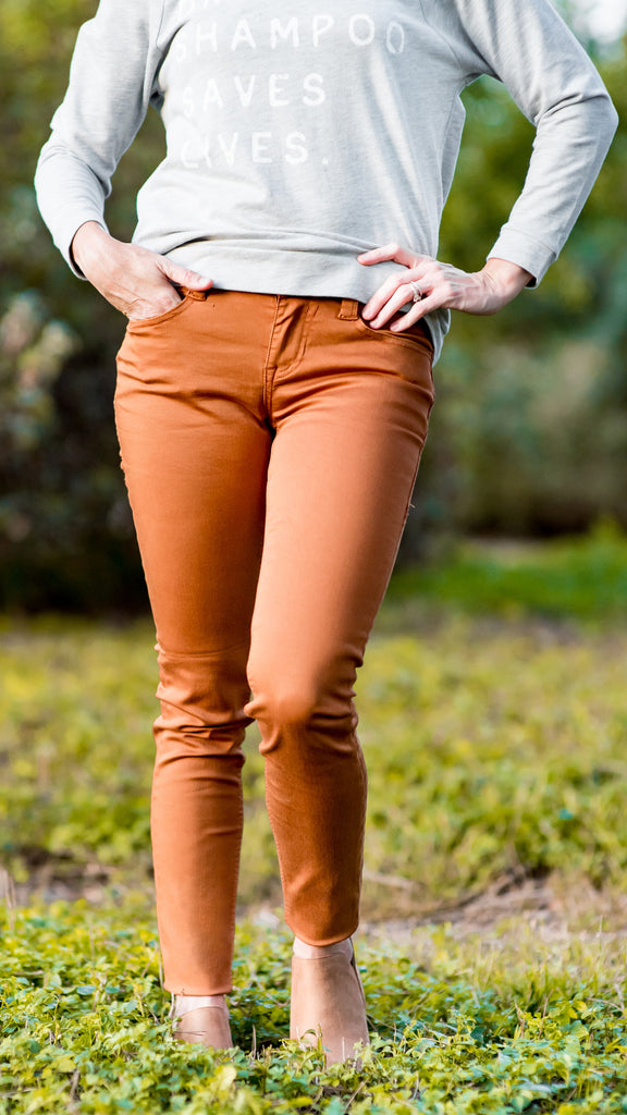 rust colored skinny jeans