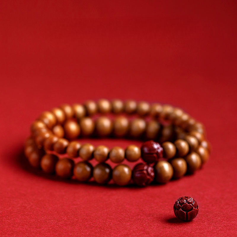 Peach Wood Cinnabar Lotus Blessing Bracelet