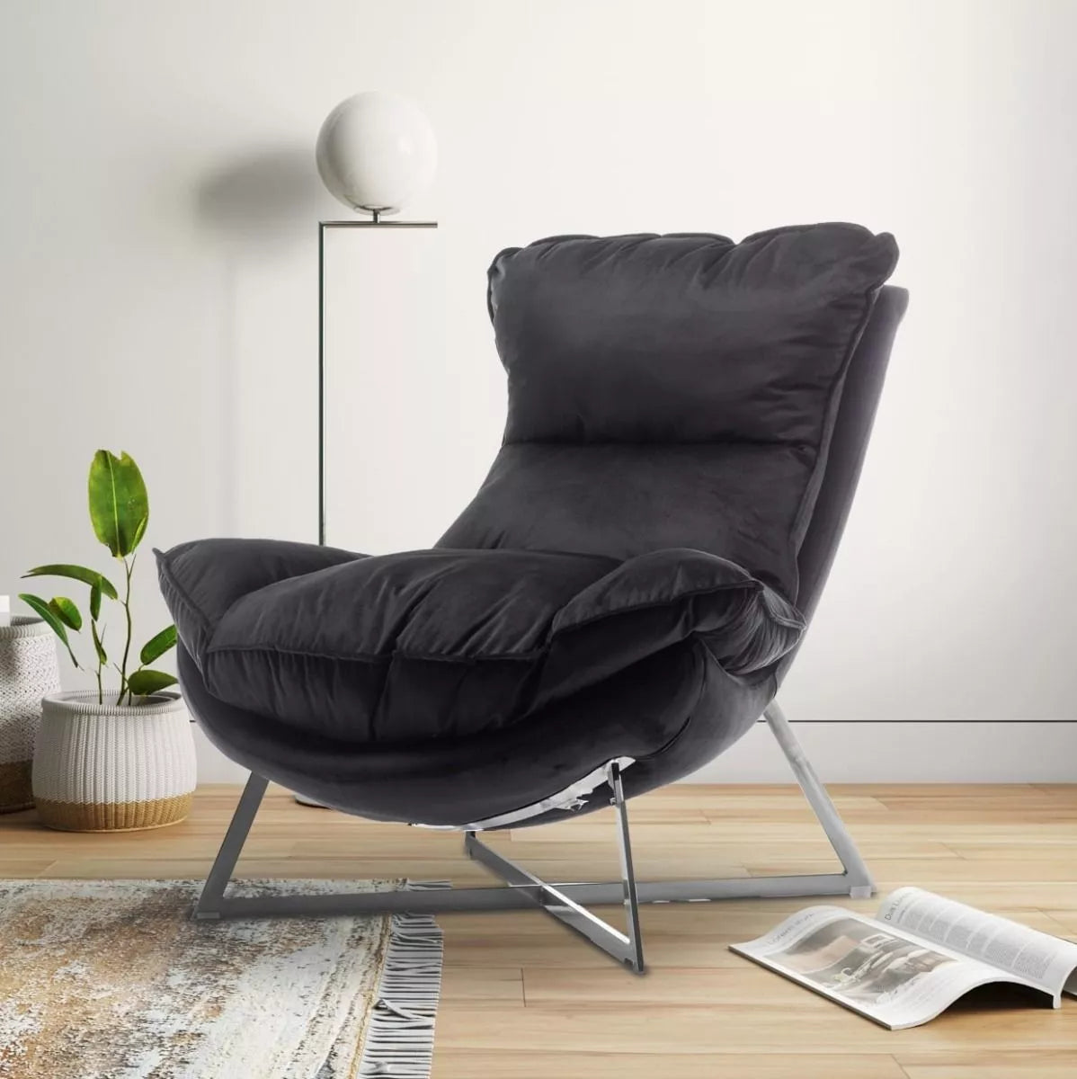 Black velvet accent chair Pierina from Stunning Chairs, on a light background