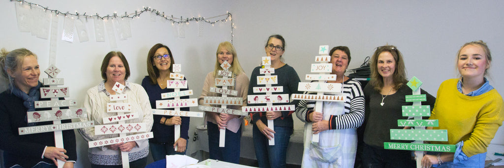 Ladies with their stenciled trees