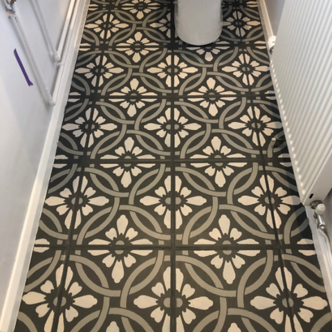 Transform old floor tiles with a stencil