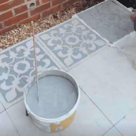 Stenciling the Patio Slabs