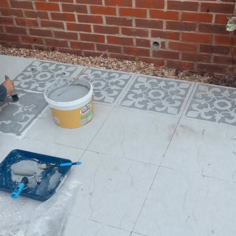 Stenciling the patio slabs