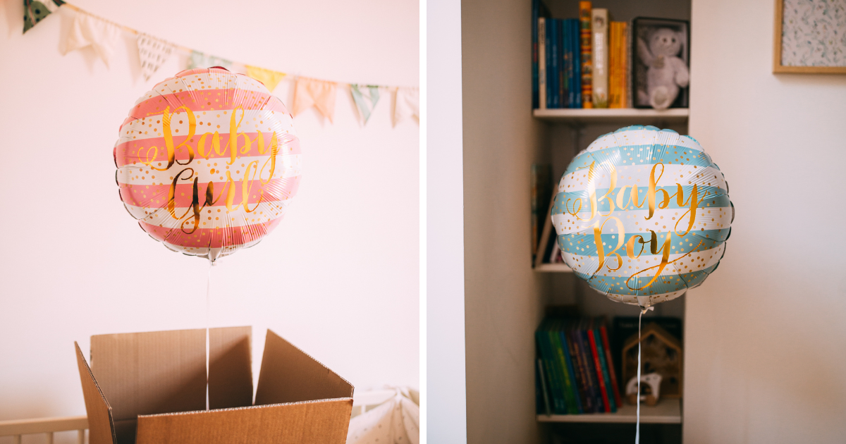 A pink "Baby Girl" and a blue "Baby Boy" balloons for gender reveal parties