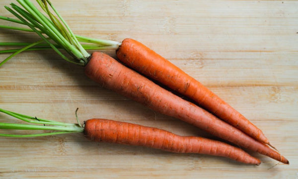 Carrots contain pectins, which bind water and make the stool firmer