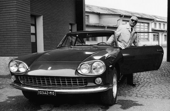 Enzo Ferrari with the Ferrari 330 GT at the Maranello factory
