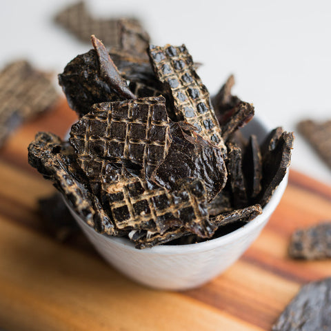 Beef Liver Treats For Dogs Placed In A White Bowl