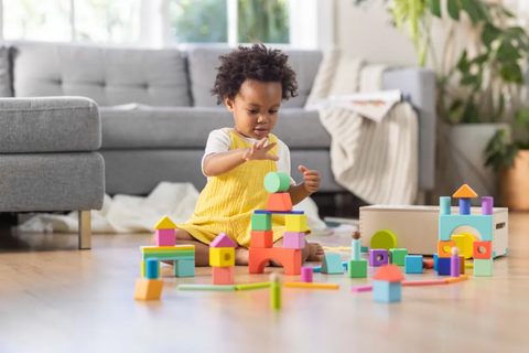 kids engaging with wodden toys