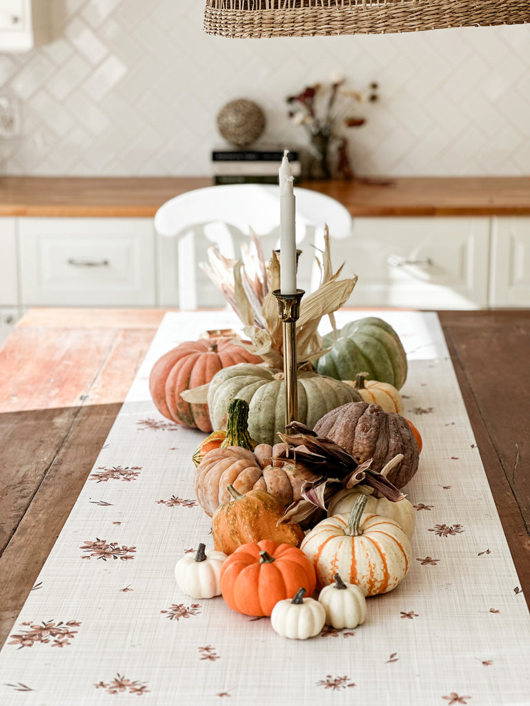 Antique floral wallpaper used as a table runner for beautiful fall decor