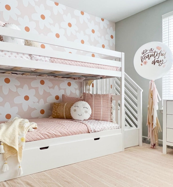 Daisy Floral wallpaper behind a white bunk bed in girls room