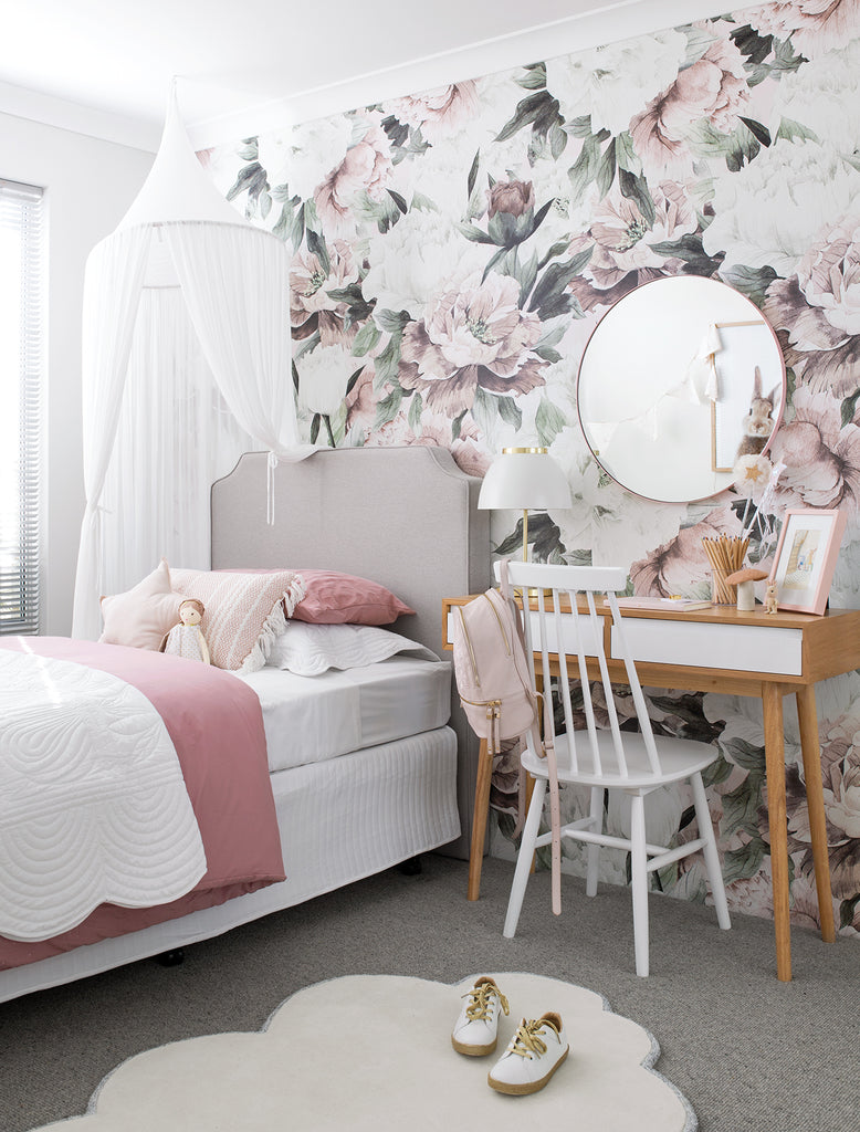 Elegant subtle pink floral wallpaper in a beautiful girls room