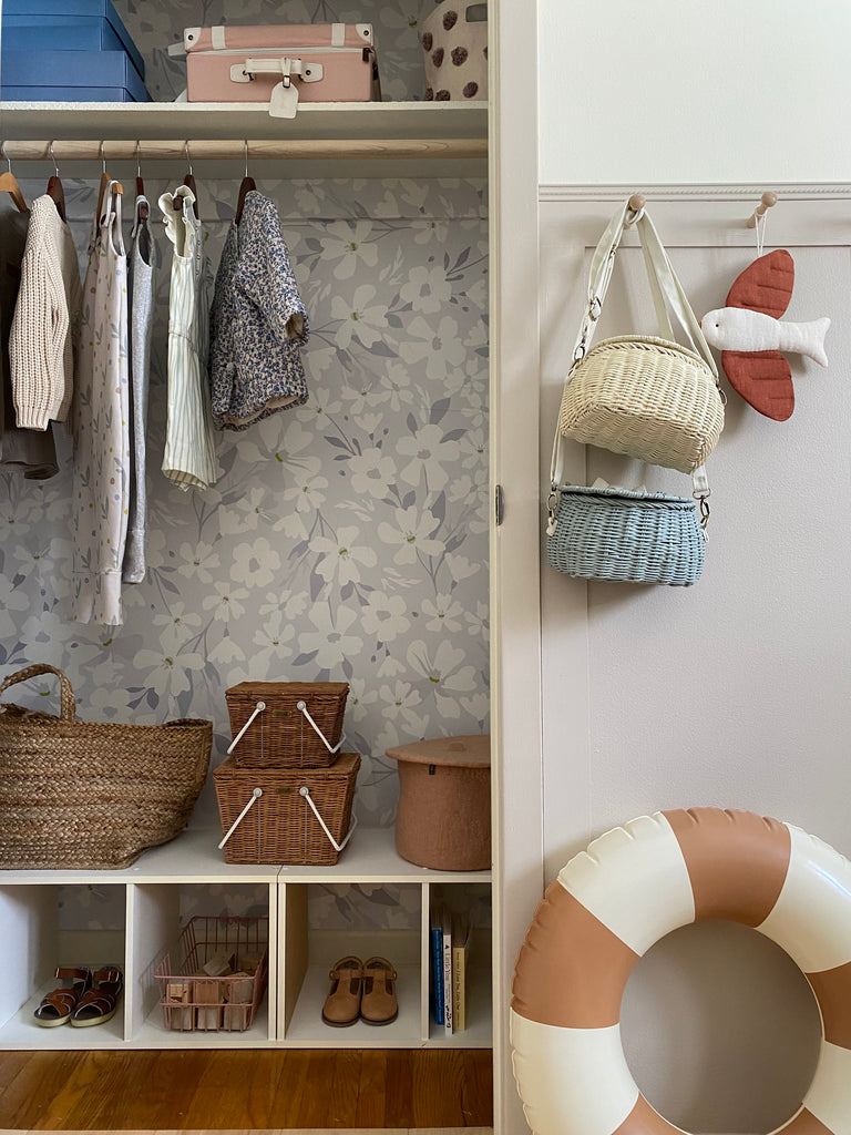 Blue floral wallpaper in a home closet, closet inspiration