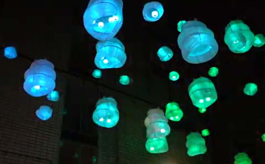 Ocean Orb lights suspended above the square outside Whites Tavern in Belfast