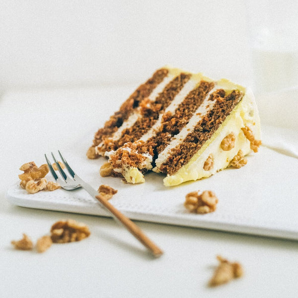 Sprinkle Club - A slice of autumn inspired iced carrot cake and a fork