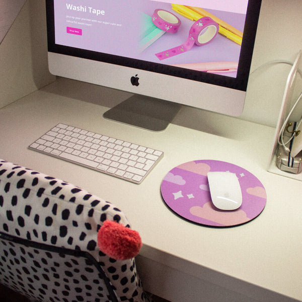 Sprinkle Club - A small home office desk with a cute kawaii mouse mat and spotty cushion