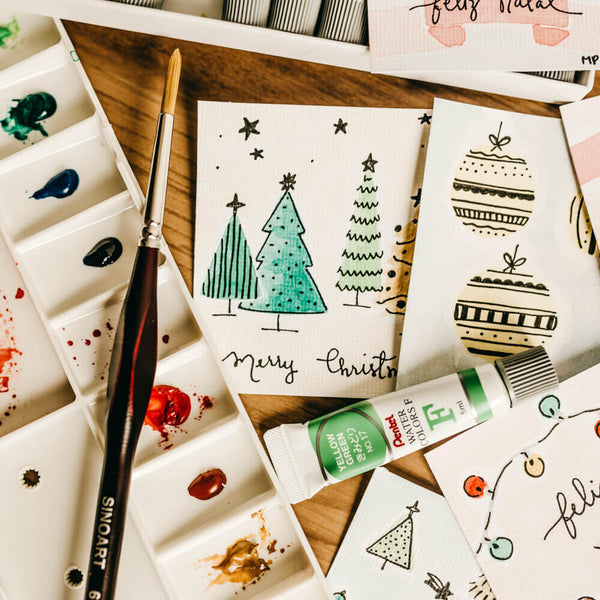 Sprinkle Club - A selection of hand painted Christmas cards with watercolour paints and a paint brush