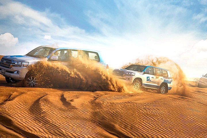 Morning Desert Safari with Dune Bashing and Sandboarding