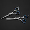 hair cutting scissors and hair thinning scissor in black background