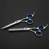 styling elegant scissor and thinner in silver color and blue finger rings