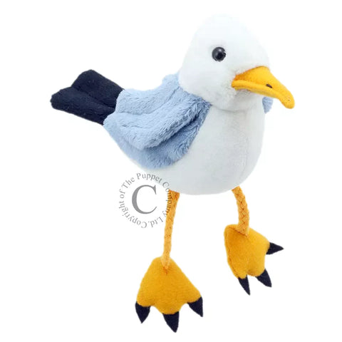 Finger Puppet of a seagull with yellow feet and beak, white body and blue wings.