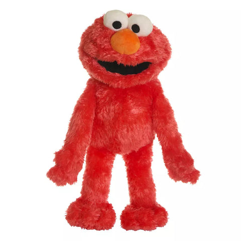 Red full bodied ahdn pupept of Elmo from sesame Street.