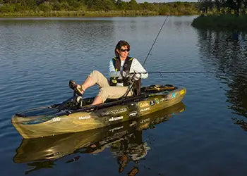 Lady fishing in a Pedal Kayak