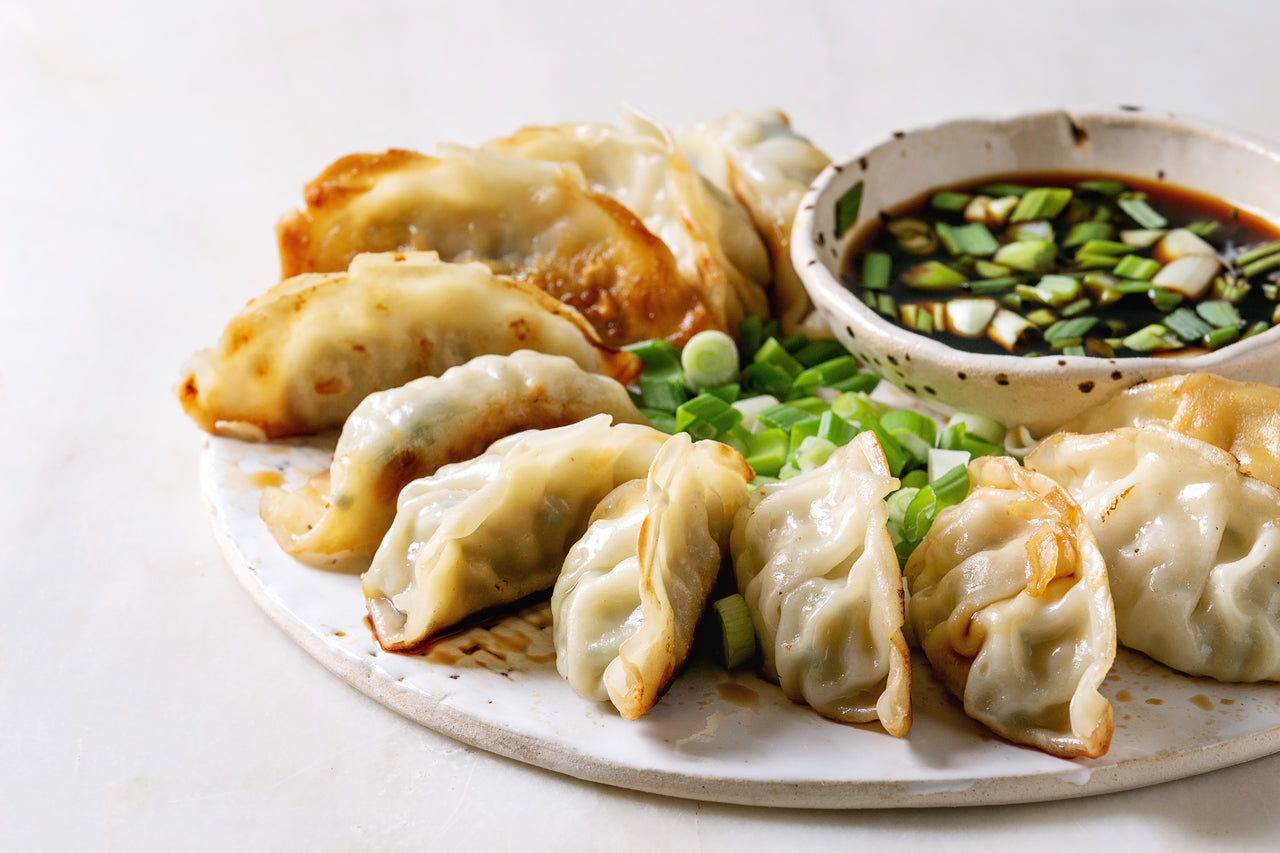 Chinese pan-fried dumplings on a plate