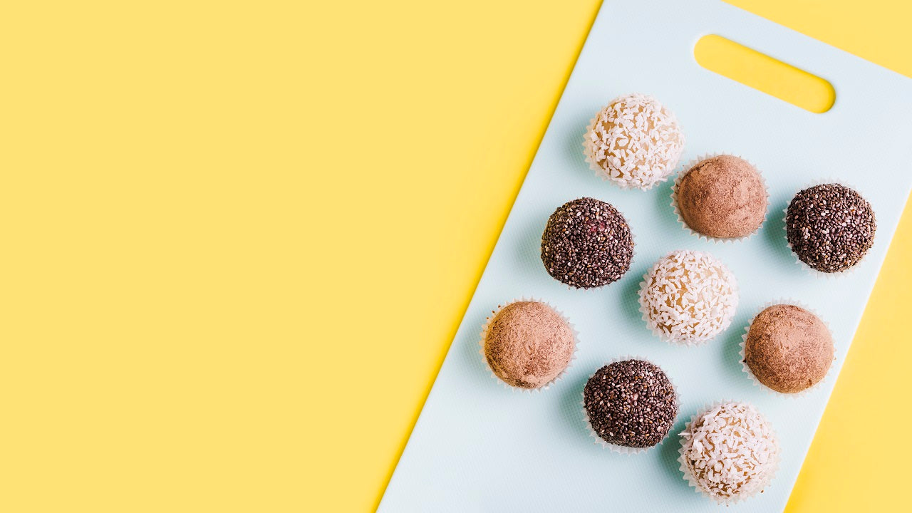 Flat lay of different types of chocolate balls