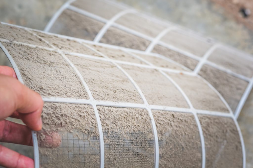 Close up of a dirty aircon filter