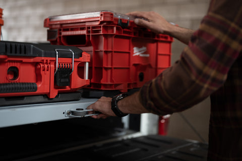 Milwaukee PACKOUT tool box and crate on GRIDRACK bed slide