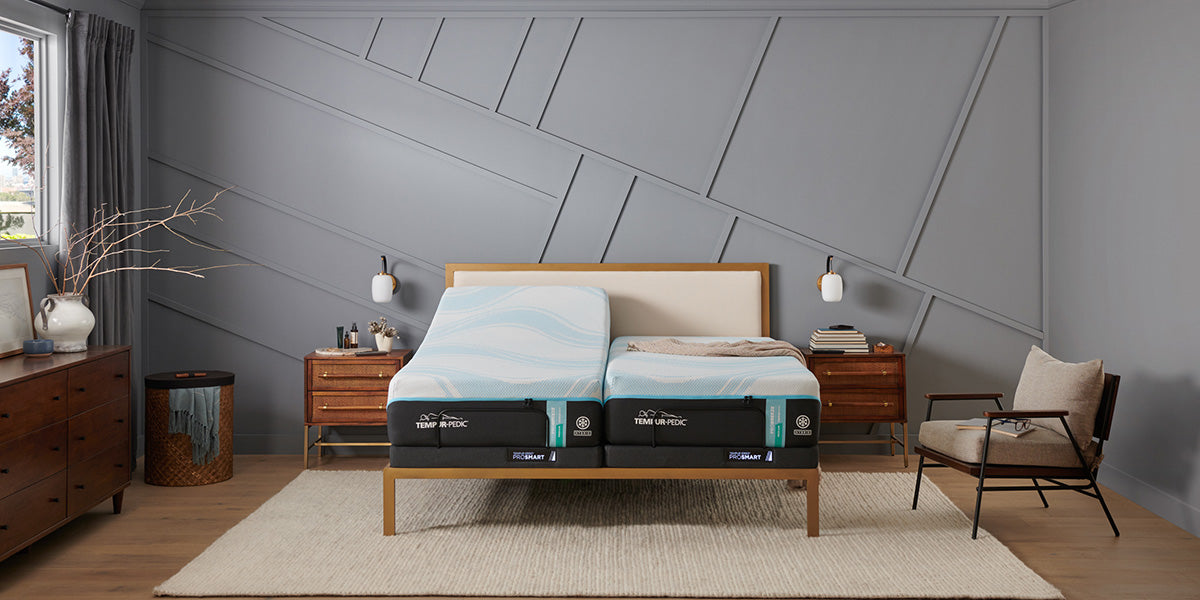 Split King Pro Breeze Medium Hybrid mattress on an adjustable base with one side having the head raised up a bit