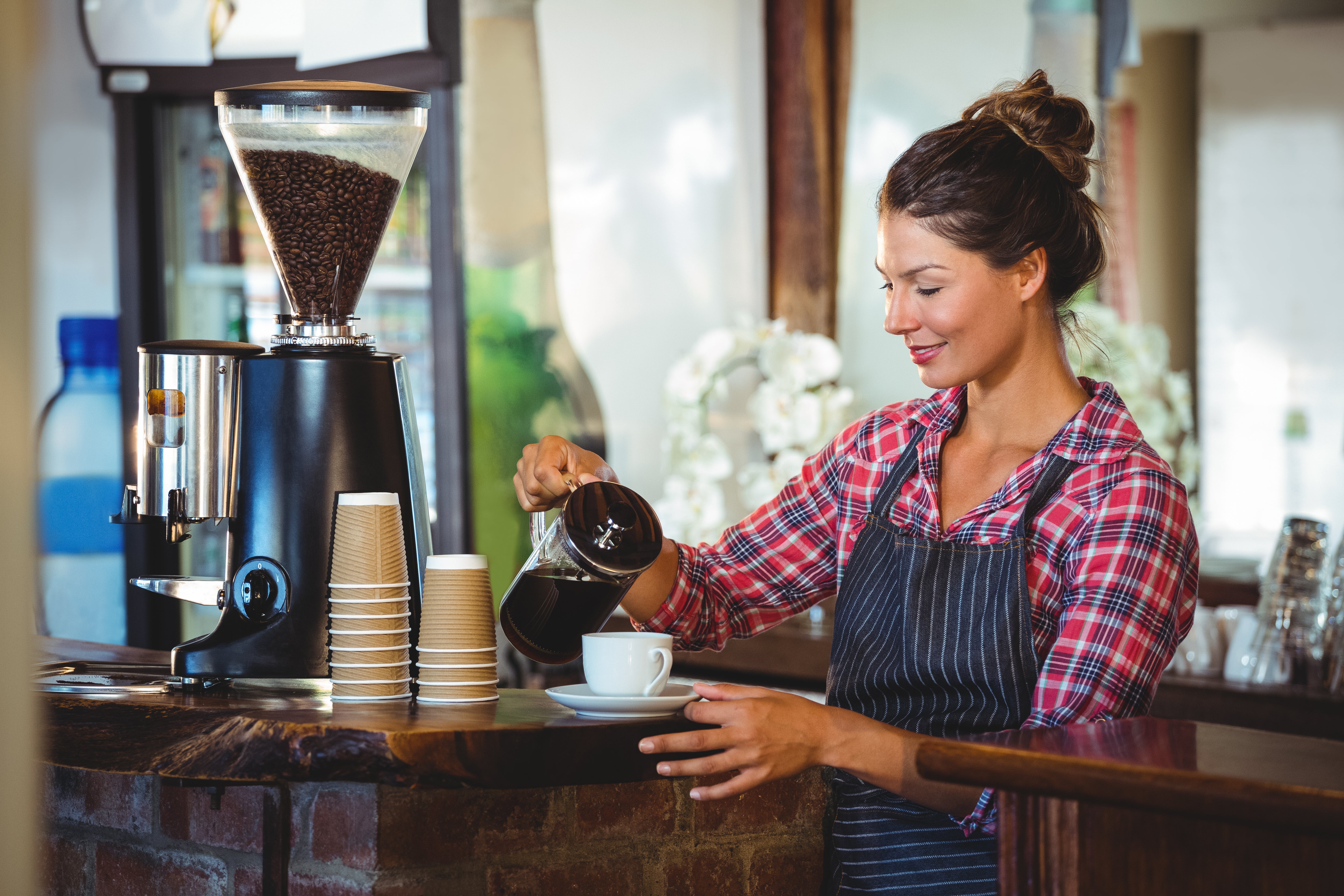 waitress-preparing-coffee.jpg__PID:2563816d-6860-42f7-8f30-6420704089a2