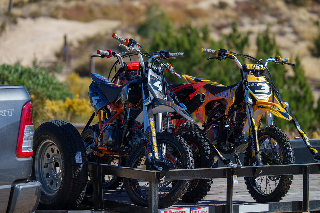 Denago Powersports MX Series Dirt Bikes Secured on a Trailer