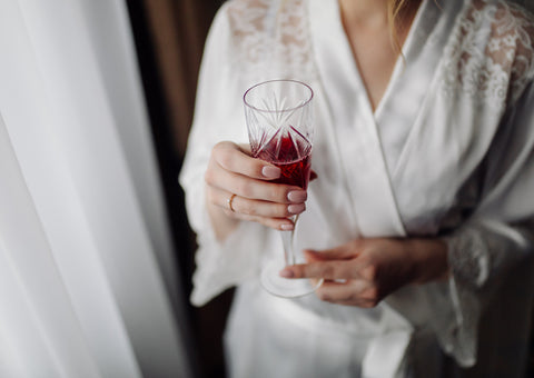 bride holding a non-alcoholic cocktail