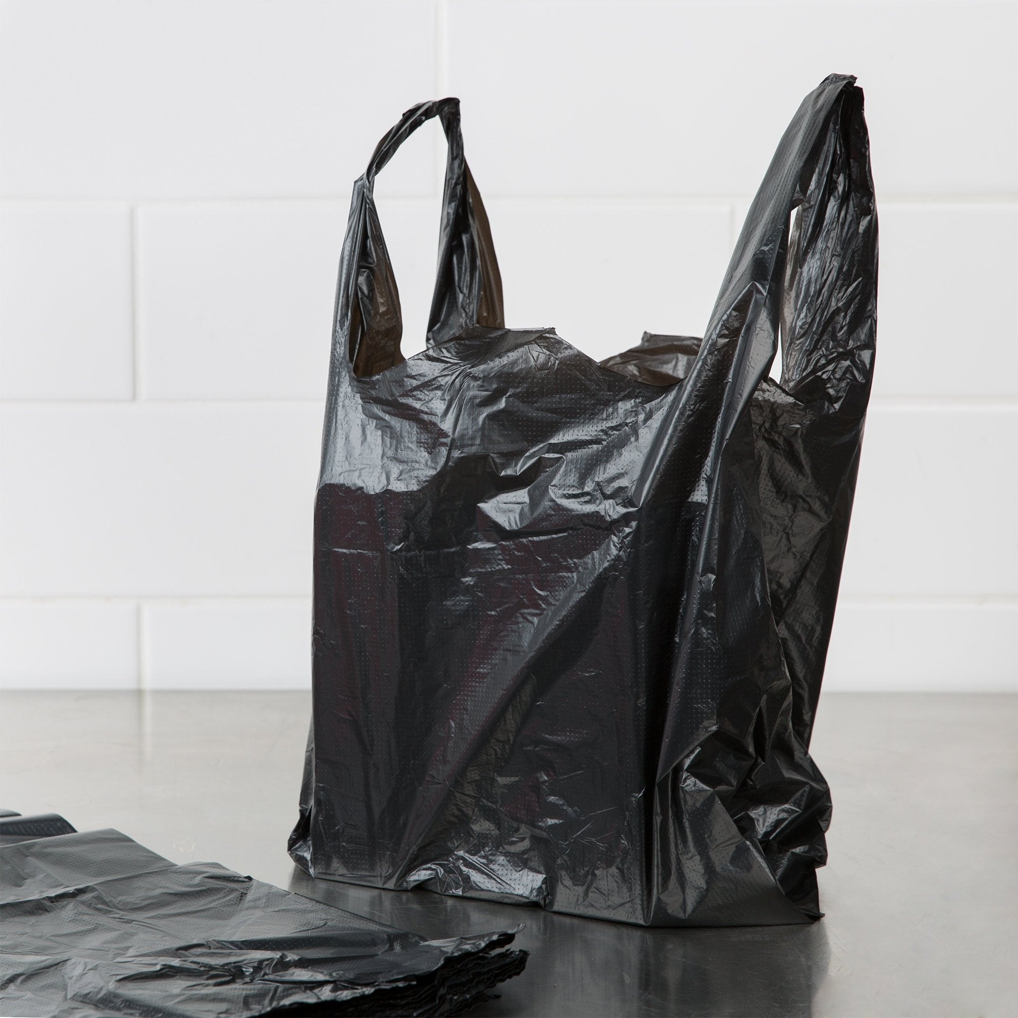 1/8 Size Black Medium-Duty Plastic T-Shirt Bag - Case of 600