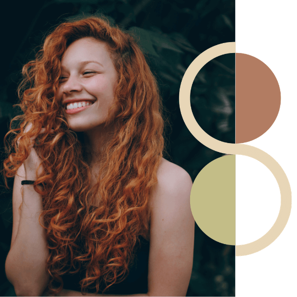A woman with red curly hair is smiling and looking away from the camera. The Seed Cycle Logo is overlaying the image on the right hand side.