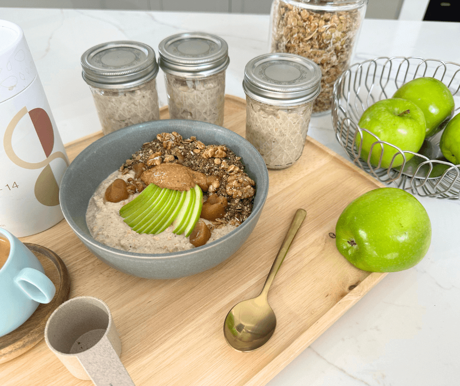 seed and oat recipe bowls and ingredients green apple, porridge, seed cycle on timber board with gold spoon and seed cycle scoop