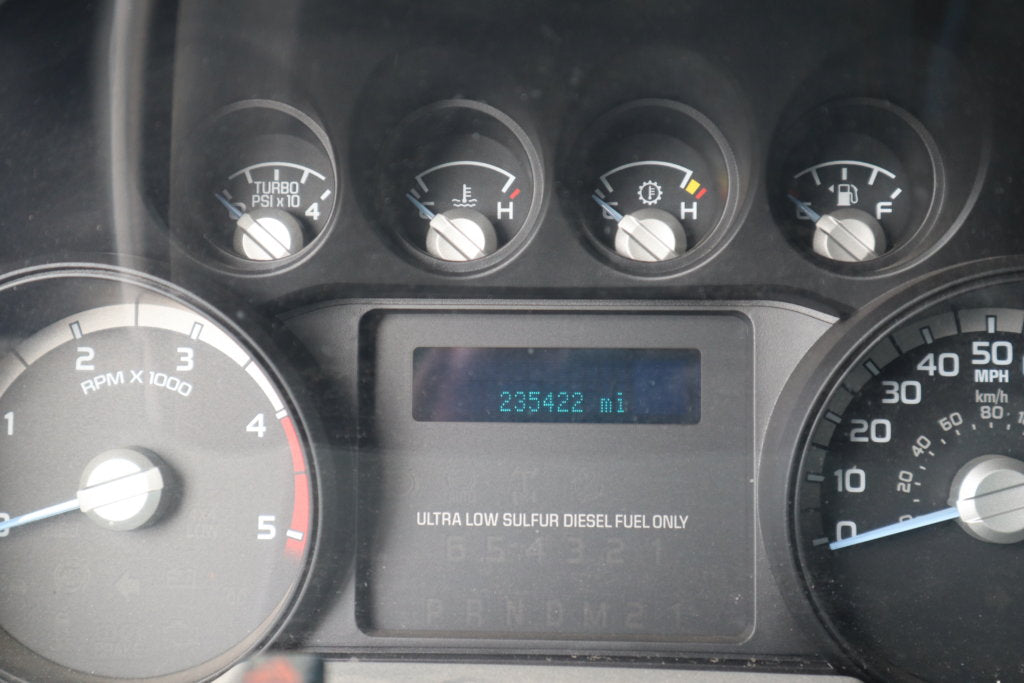 Odometer with 235,422 miles on it.