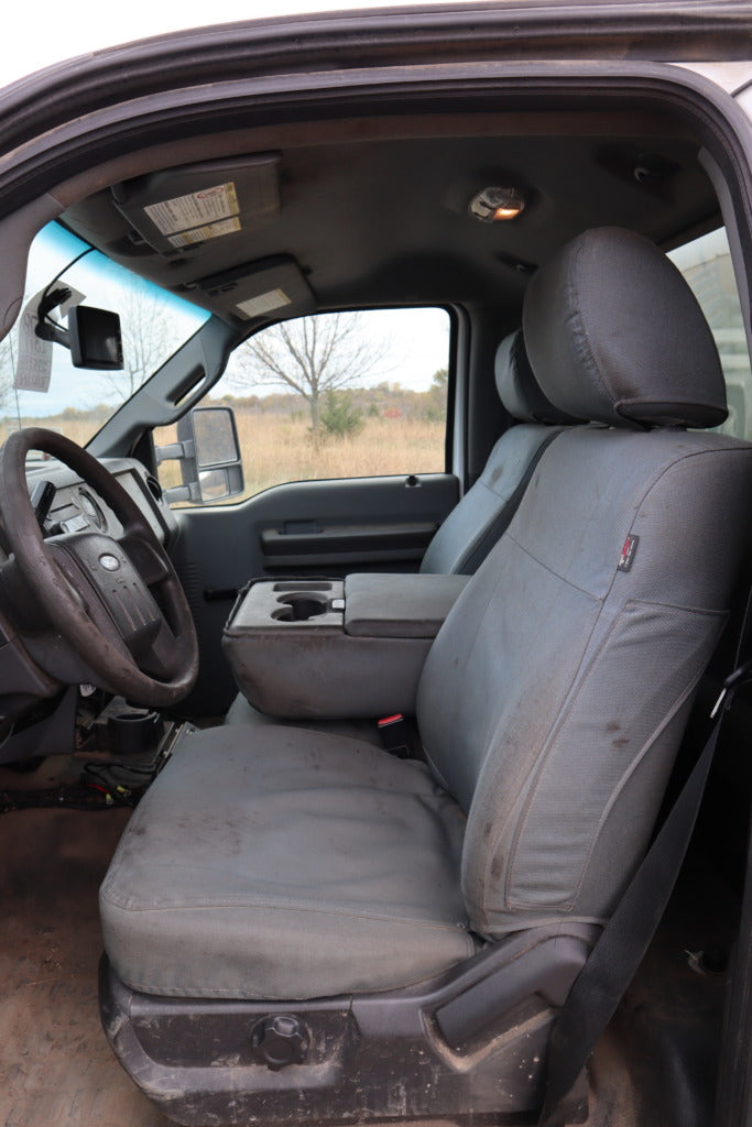 Used TigerTough seat covers in a truck.